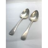 Pair of antique Georgian silver table spoons each measures approx 22cm London silver hallmarks weigh