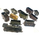 Vintage o gauge loco 4256 with tender and 9 rolling stock in unclean played with condition