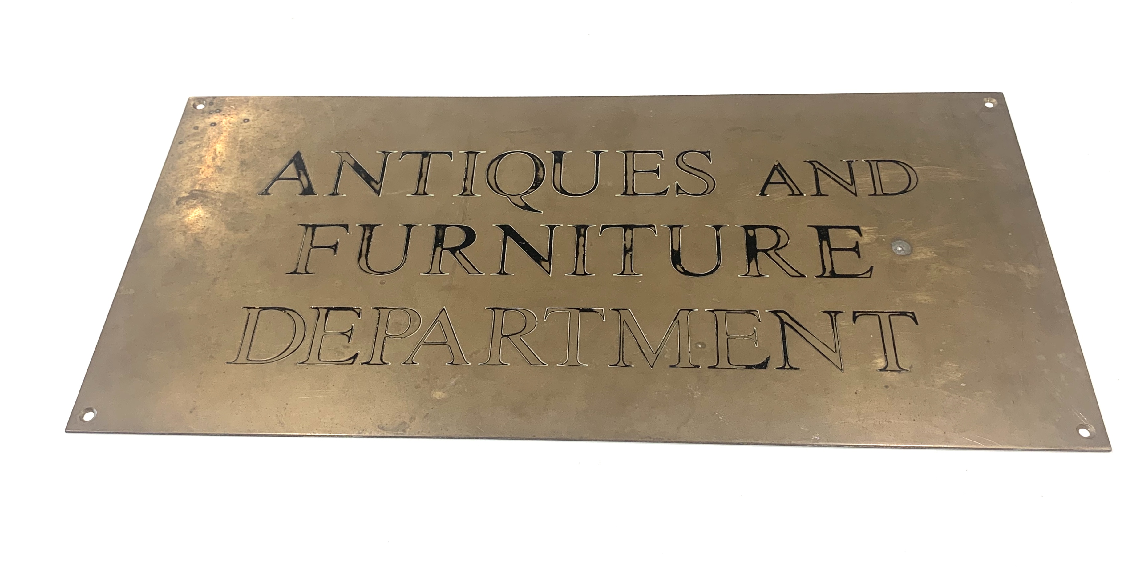 Mid 20th Century brass plaque - possibly from a Department Store. ANTIQUES & FURNITURE DEPARTMENT.
