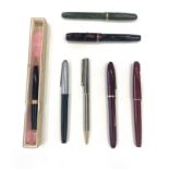 A collection of mid 20th Century fountain pens and one propelling pencil. Parker, Waterman & Conway