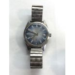 Vintage gents Rigi wristwatch watch is ticking but no warranty given please see images for condition