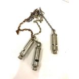 3 Vintage whistles on chains includes J.Hudson 1937 A.M 293/W/102 and J.Hudson military C.N 1980