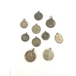 Collection of 10 vintage silver St Christopher medals