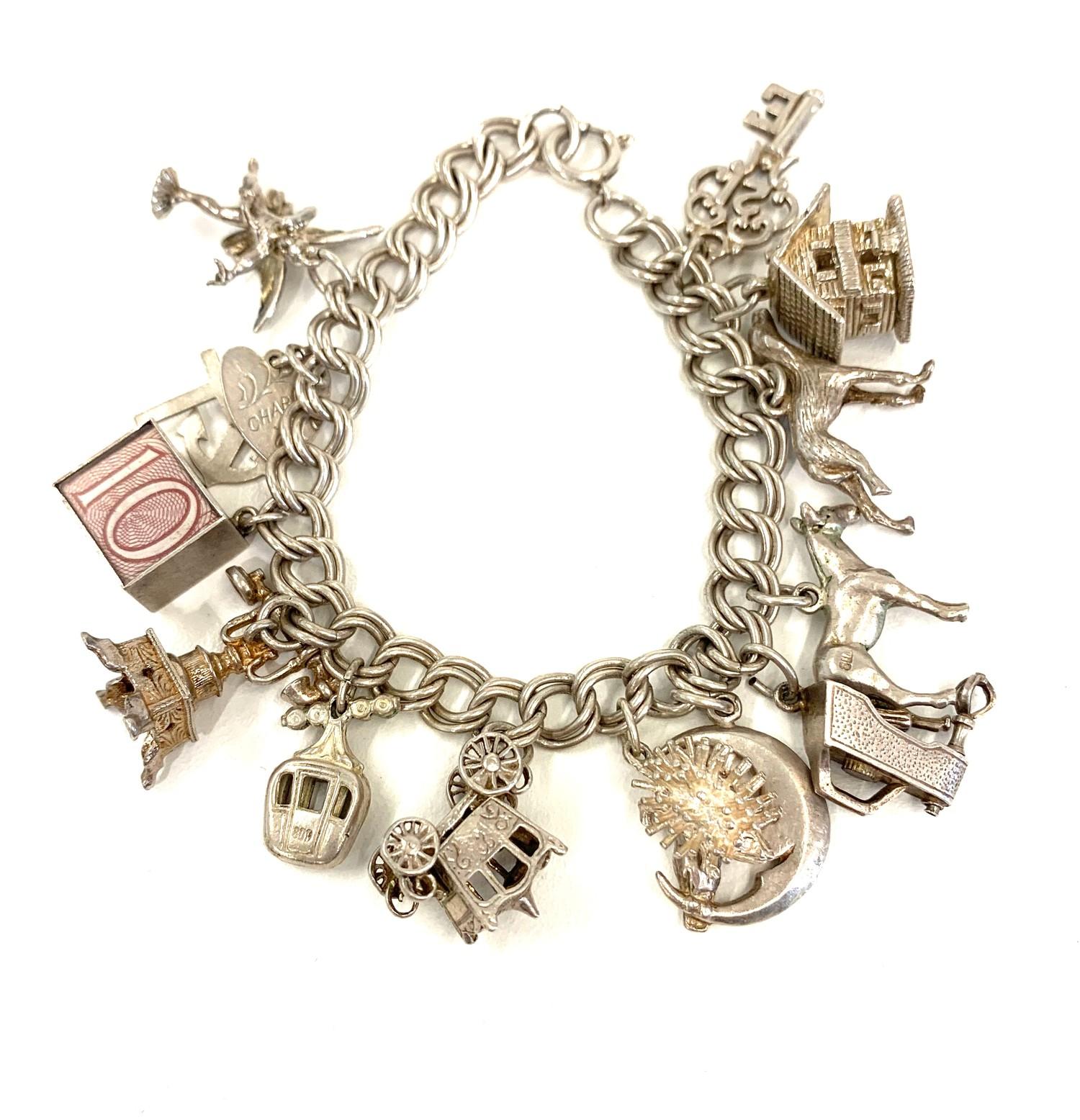 Vintage silver charm bracelet weight 50g