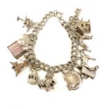 Vintage silver charm bracelet weight 50g