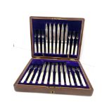 Boxed antique mother of pearl handle 12 setting fish knives and forks in good original condition