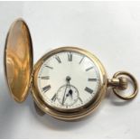 Full hunter gold plated pocket watch by Labrador Eary Omega winds and ticks but no warranty given