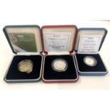 3 Boxed silver proof coins 2 x £2 and one pound coins