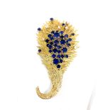 Fine large 18ct gold jewel set pendant/brooch by Andrew Grima set with blue and white sapphires