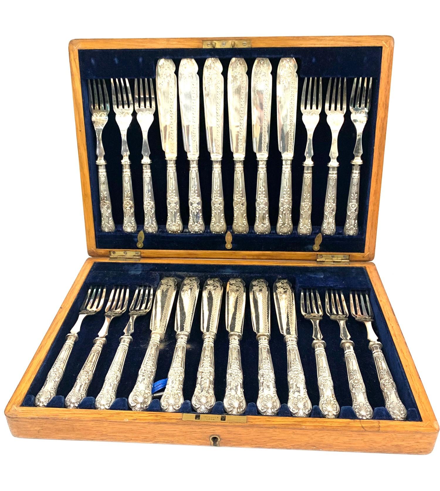 Boxed antique silver 12 setting fish knives and forks in good original condition