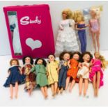 Quantity of vintage Sindy dolls, complete with case and clothes