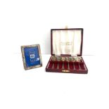 Boxed set of silver hallmarked tea spoons, and a sterling silver picture frame