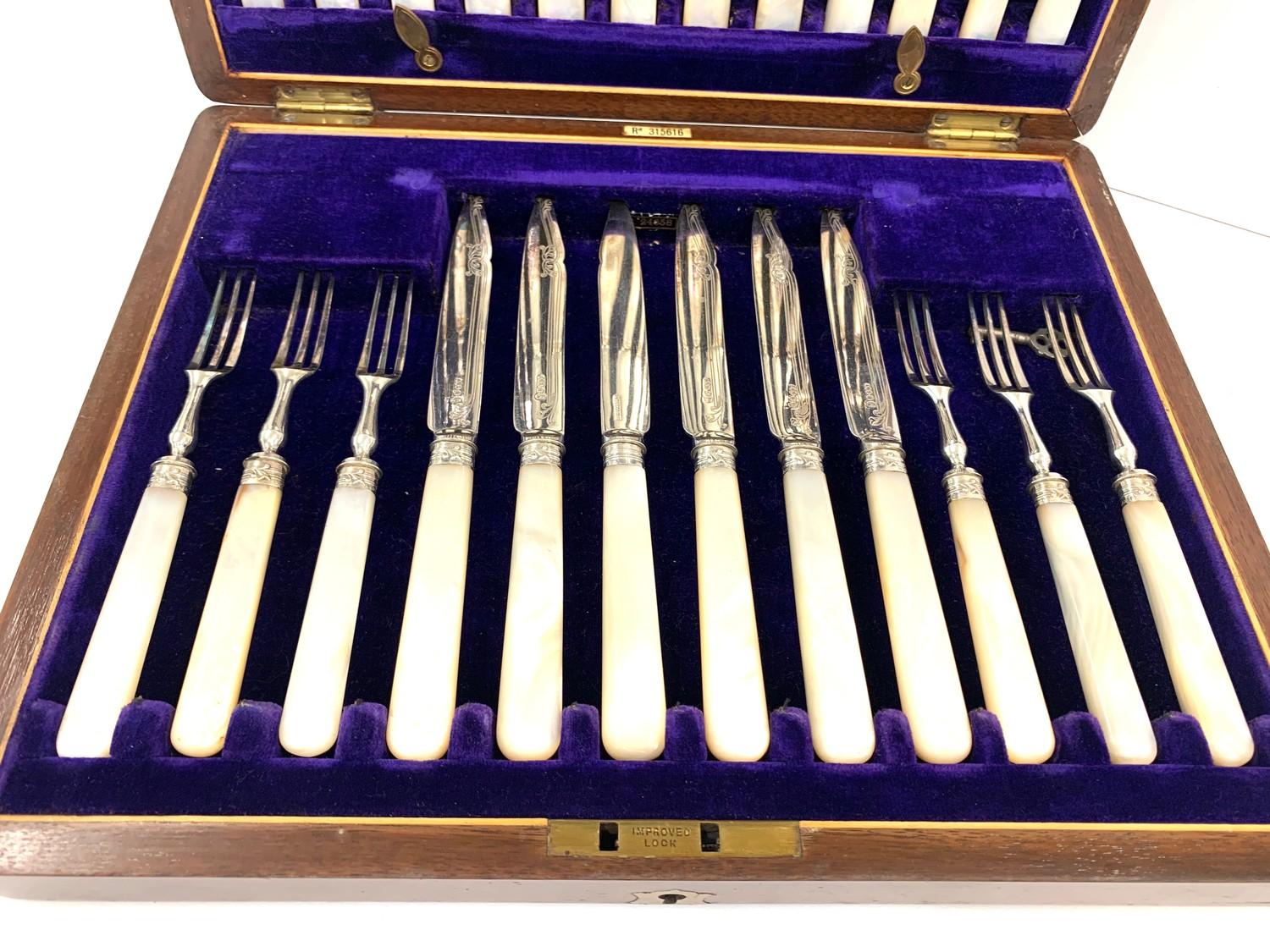 Boxed antique mother of pearl handle 12 setting fish knives and forks in good original condition - Image 2 of 4