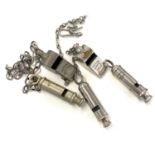 Selection of 5 vintage whistles on chains