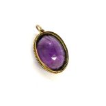 Antique gold mounted amethyst pendant measures approx 3cm by 2.3cm