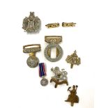 Selection of military cap badges