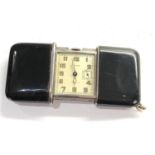 Movado Ermeto purse watch black enamel and Silver the watch is in good working condition corner