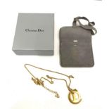 Boxed Christian Dior gold tone pendant and chain