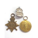 Pair of ww1 medal and silver arp badge