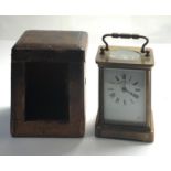 Cased antique brass carriage clock not working