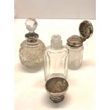 3 silver top perfume bottles complete with stoppers