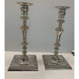 Pair of cast silver candle sticks, measure approx 10" tall weight approx 1400.9g