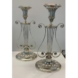 Pair of silver Lyre candlesticks, measure approx 13" tall 6.5" wide, weight approx 18895.5g