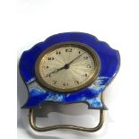 Vintage small silver and enamel bedside clock damage to enamel as shown winds and ticks but no