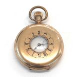 Antique gold plated half hunter pocket watch the watch winds and ticks but no warranty given