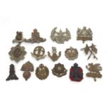 Selection of military cap badges etc