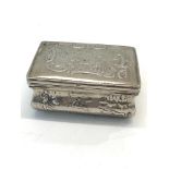 Antique continental silver snuff box measures approx 8cm by 6cm by 3.6cm