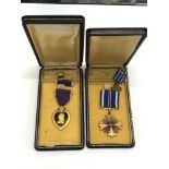 Boxed Distinguished Flying Cross with miniature and boxed purple heart