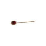 18ct gold cabachon garnet stick pin hallmarked 18 on back of head measures approx 62mm long