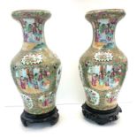 large pair of Chinese vases on wooden carved stands each measures approx 43cm including stands in