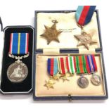 Collection of ww2 medals includes national service medal 2 ww2 stars and ww2 miniature medals