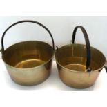 2 Large antique brass jam pans with iron handles largest measures approx 32cm dia height 16cm