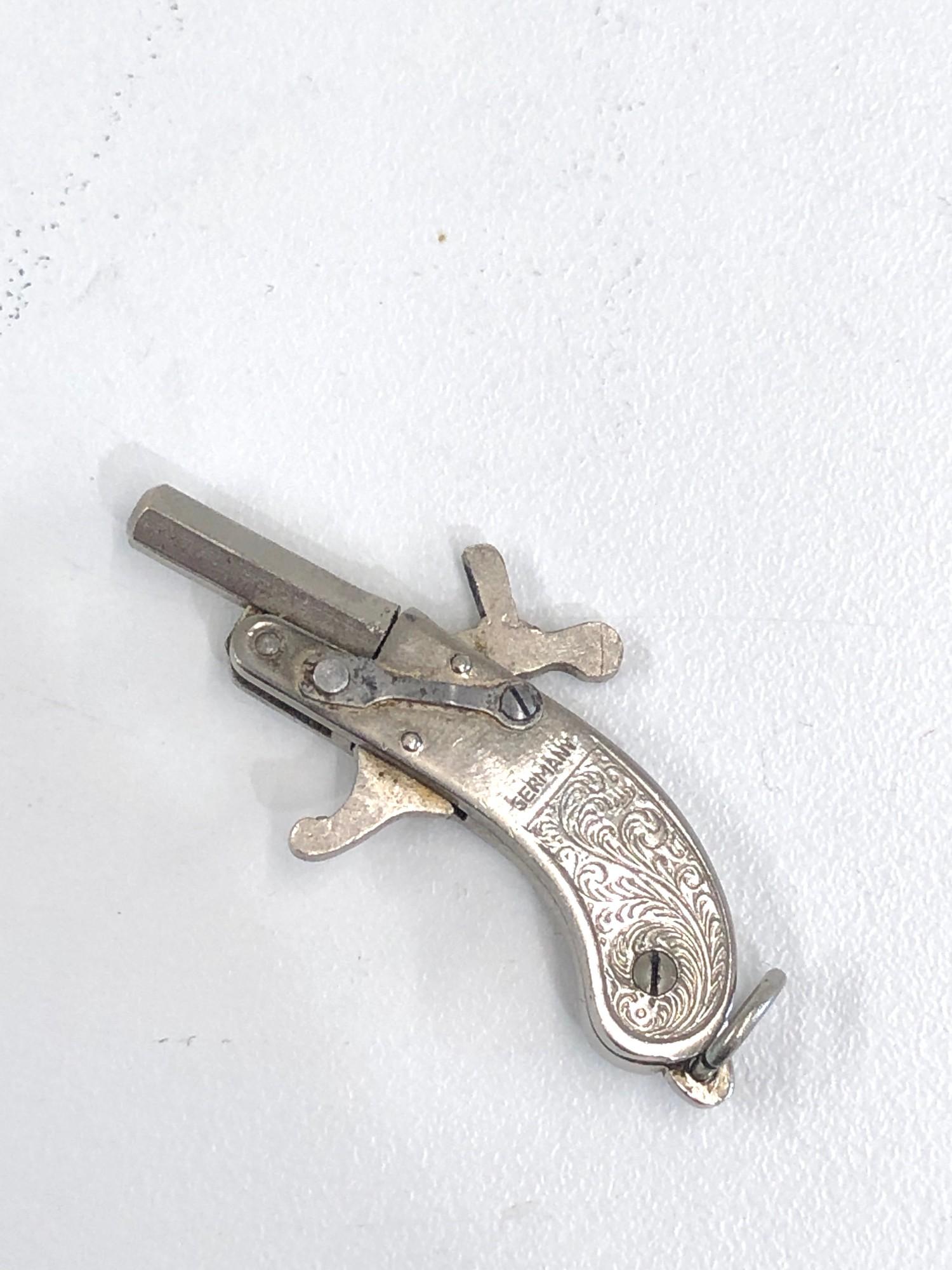 Miniature rimfire pistol