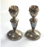 Pair of silver candle sticks Birmingham silver hallmarks measure approx height 12.4cm filled bases
