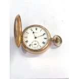 Gold plated full hunter Waltham u.s.a pocket watch the watch winds and ticks but no warranty given