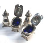 Silver cruet set with blue glass liners Birmingham silver hallmarks please see images for details