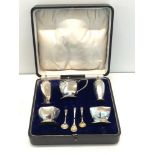 Boxed silver cruet set complete with spoons blue glass liners in fitted case Birmingham silver