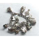 Vintage silver charm bracelet weight 57g