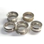 5 Silver napkin rings