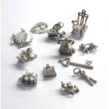 Selection of 12 vintage silver charm bracelet charms