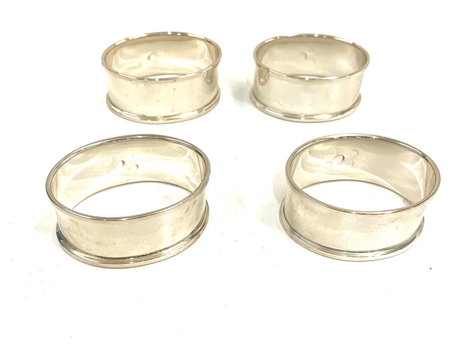 Set of 4 silver serviette rings