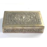 Ornate embossed 900 silver cigarette box measures approx. 12cm by 8.3cm hallmarked t.900