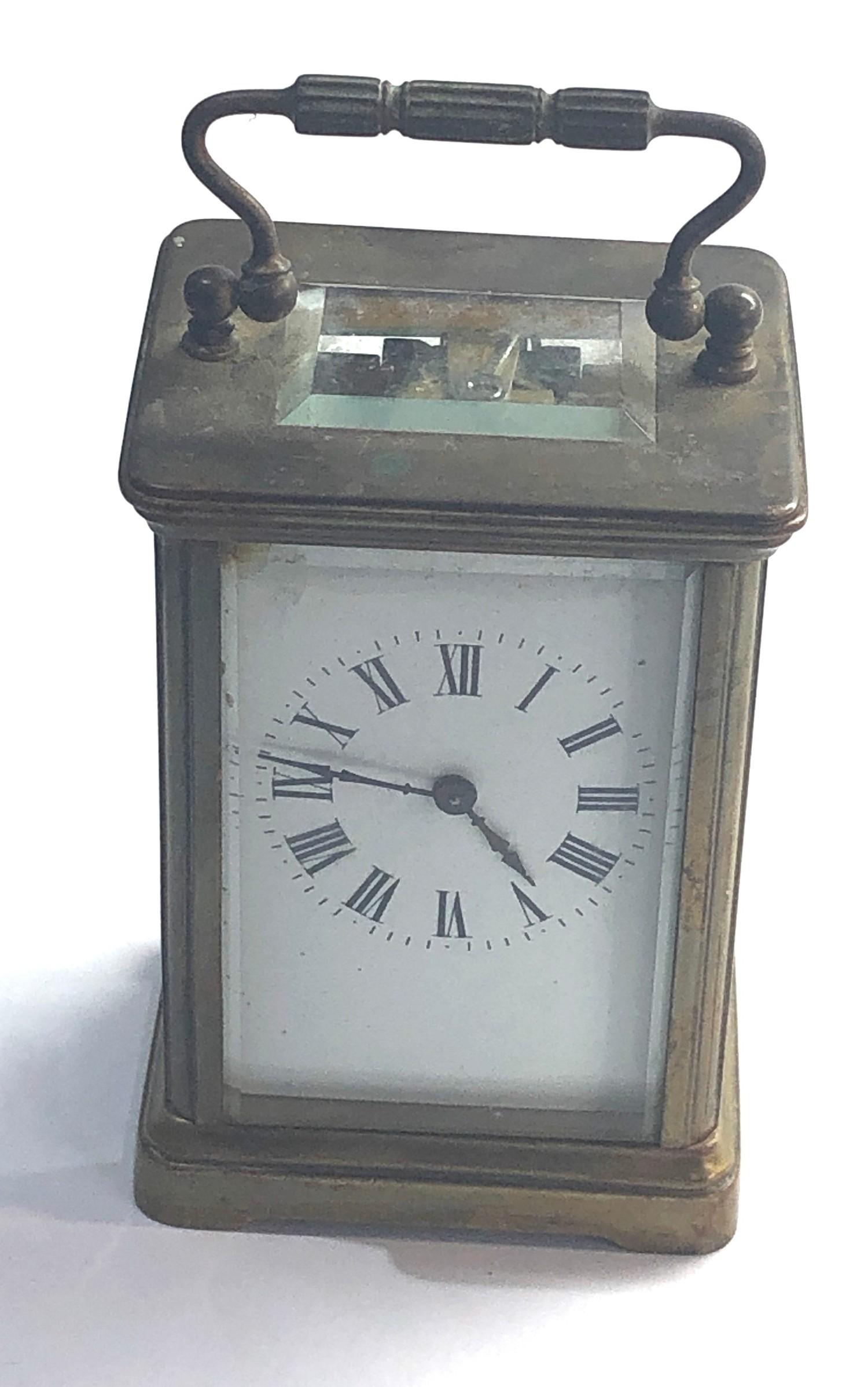 Vintage brass carriage clock in working order but no warranty given