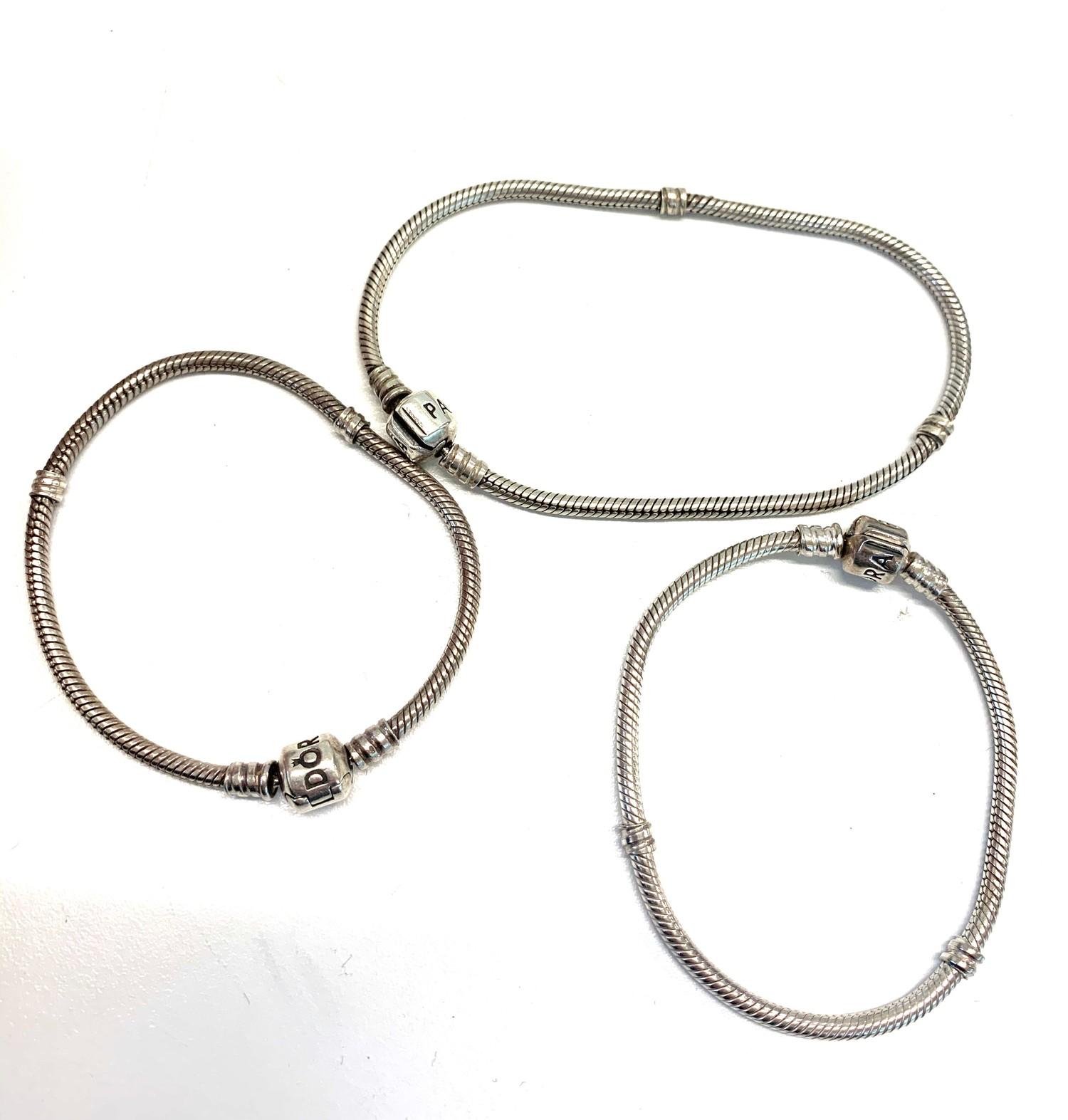 3 silver Pandora bracelets