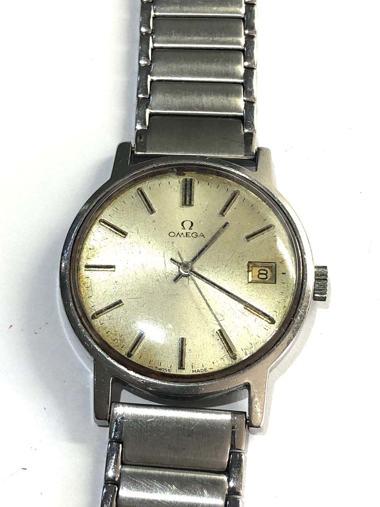 Vintage gents omega wristwatch it is in working order but no warranty given please see images for