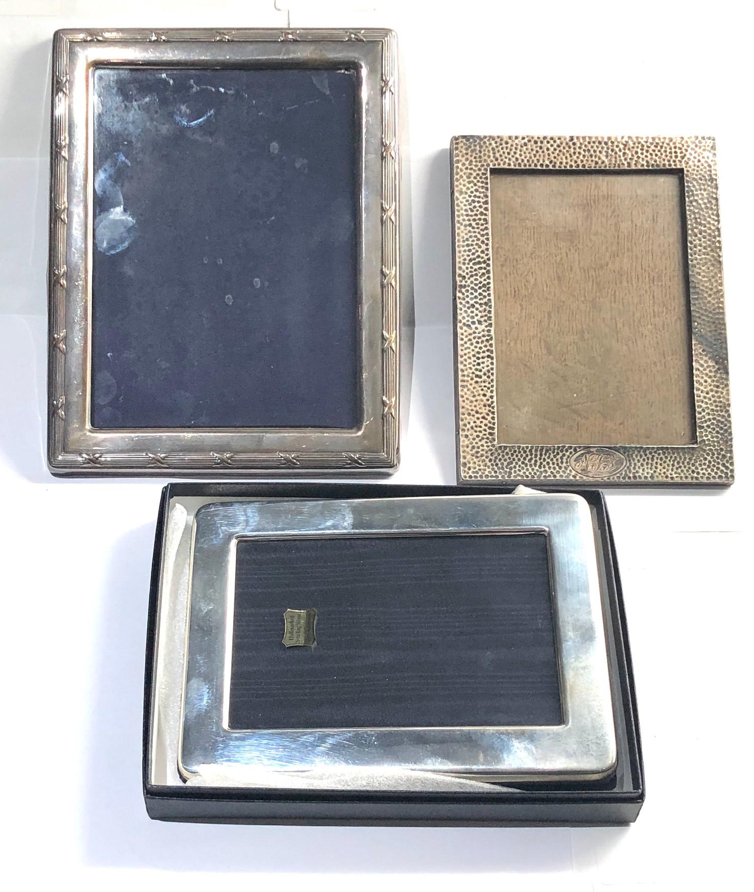 3 silver picture frames 1 boxed largest measures approx 21cm by 17cm